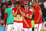 VIENNA, AUSTRIA - JUNE 16: Andreas Ivanschitz (#10), Erwin Hoffer (#22) and Roman Kienast of Austria look dejected after defeat in the UEFA EURO 2008 Group B match between Austria and Germany at Ernst Happel Stadion on June 16, 2008 in Vienna, Austria.  (Photo by Jamie McDonald/Getty Images)