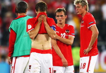 VIENNA, AUSTRIA - JUNE 16: Andreas Ivanschitz (#10), Erwin Hoffer (#22) and Roman Kienast of Austria look dejected after defeat in the UEFA EURO 2008 Group B match between Austria and Germany at Ernst Happel Stadion on June 16, 2008 in Vienna, Austria.  (Photo by Jamie McDonald/Getty Images)