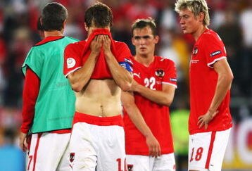VIENNA, AUSTRIA - JUNE 16: Andreas Ivanschitz (#10), Erwin Hoffer (#22) and Roman Kienast of Austria look dejected after defeat in the UEFA EURO 2008 Group B match between Austria and Germany at Ernst Happel Stadion on June 16, 2008 in Vienna, Austria.  (Photo by Jamie McDonald/Getty Images)