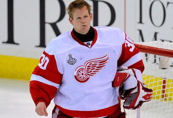 PITTSBURGH - JUNE 09:  Goaltender Chris Osgood #30 of the Detroit Red Wings reacts after being scored on in the second period by Jordan Staal #11 (not pictured) of the Pittsburgh Penguins during Game Six of the NHL Stanley Cup Finals at the Mellon Arena on June 9, 2009 in Pittsburgh, Pennsylvania.  (Photo by Jamie Sabau/Getty Images)