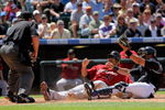 DENVER - MAY 14:  Carlos Lee #45 of the Houston Astros is called out by homeplate umpire Charlie Redford as he slides into home and is tagged out by catcher Yorvit Torrealba #8 of the Colorado Rockies as Lee tried to score on a double by Hunter Pence in the third inning during MLB action at Coors Field on May 14, 2009 in Denver, Colorado.  (Photo by Doug Pensinger/Getty Images)