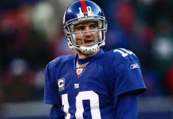 EAST RUTHERFORD, NJ -  JANUARY 11:  Eli Manning #10 of the New York Giants looks on against the Philadelphia Eagles during the NFC Divisional Playoff Game on January 11, 2009 at Giants Stadium in East Rutherford, New Jersey.  The Eagles defeated the Giants 23 -11. (Photo by Chris McGrath/Getty Images)