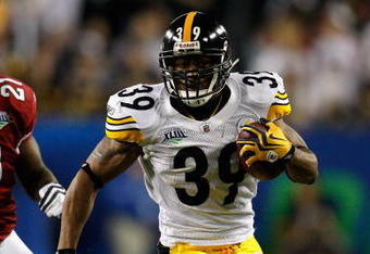 TAMPA, FL - FEBRUARY 01:  Willie Parker #39 of the Pittsburgh Steelers runs the ball in the first quarter against Antrel Rolle #21 of the Arizona Cardinals during Super Bowl XLIII on February 1, 2009 at Raymond James Stadium in Tampa, Florida.  (Photo by Chris Graythen/Getty Images)