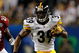 TAMPA, FL - FEBRUARY 01:  Willie Parker #39 of the Pittsburgh Steelers runs the ball in the first quarter against Antrel Rolle #21 of the Arizona Cardinals during Super Bowl XLIII on February 1, 2009 at Raymond James Stadium in Tampa, Florida.  (Photo by Chris Graythen/Getty Images)