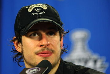 PITTSBURGH - JUNE 09:  Sidney Crosby #87 of the Pittsburgh Penguins speaks to the media during a press conference after Game Six of the NHL Stanley Cup Finals at the Mellon Arena on June 9, 2009 in Pittsburgh, Pennsylvania.  (Photo by Jim McIsaac/Getty Images)