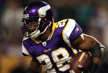 MINNEAPOLIS - JANUARY 4:   Adrian Peterson #28 of the Minnesota Vikings carries the ball in the first half against the Philadelphia Eagles during the NFC Wild Card playoff game on January 4,2009 at the Hubert H. Humphrey Metrodome in Minneapolis, Minnesota. (Photo by Elsa/Getty Images)