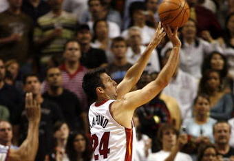 MIAMI - APRIL 11:  Forward Jason Kapono #24 of the Miami Heat shoots against the Washington Wizards in the fourth period on April 11, 2007 at the American Airlines Arena in Miami, Florida.  NOTE TO USER: User expressly acknowledges and agrees that, by downloading and/or using this Photograph, User is consenting to the terms and conditions of the Getty Images License Agreement.  (Photo by Eliot J. Schechter/Getty Images)
