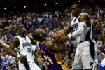 ORLANDO, FL - JUNE 09:  Kobe Bryant #24 of the Los Angeles Lakers goes up for a shot against Dwight Howard #12 of the Orlando Magic as Howard was called for a foul in Game Three of the 2009 NBA Finals on June 9, 2009 at Amway Arena in Orlando, Florida.  NOTE TO USER:  User expressly acknowledges and agrees that, by downloading and or using this photograph, User is consenting to the terms and conditions of the Getty Images License Agreement.  (Photo by Chris Graythen/Getty Images)