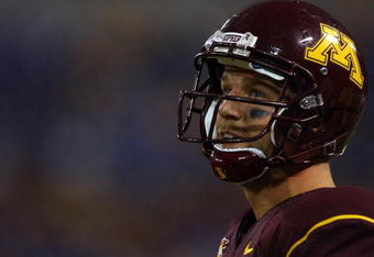 MINNEAPOLIS - SEPTEMBER 13:  Quarterback Adam Weber #8 of the Minnesota Golden Gophers looks on from the sideline against the Montana State Bobcats at the Metrodome on September 13, 2008 in Minneapolis, Minnesota. Minnesota defeated Montana State 35-23.  (Photo by Jeff Gross/Getty Images)