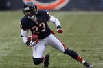 CHICAGO - DECEMBER 07: Devin Hester #23 of the Chicago Bears runs for yardage after catching a pass against the Jacksonville Jaguars on December 7, 2008 at Soldier Field in Chicago, Illinois. The Bears defeated the Packers 23-10. (Photo by Jonathan Daniel/Getty Images)
