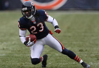 CHICAGO - DECEMBER 07: Devin Hester #23 of the Chicago Bears runs for yardage after catching a pass against the Jacksonville Jaguars on December 7, 2008 at Soldier Field in Chicago, Illinois. The Bears defeated the Packers 23-10. (Photo by Jonathan Daniel/Getty Images)