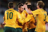 SYDNEY, AUSTRALIA - JUNE 10:  David Carney (R) of the Socceroos is congratulated by team-mates after scoring during the 2010 FIFA World Cup Asian qualifying match between the Australian Socceroos and Bahrain at ANZ Stadium on June 10, 2009 in Sydney, Australia.  (Photo by Mark Nolan/Getty Images)