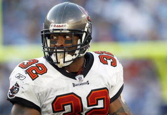 CHARLOTTE, NC - SEPTEMBER 30: Running back Michael Pittman #32 of the Tampa Bay Buccaneers rushes upfield against the Carolina Panthers during the game at Bank of America Stadium on September 30, 2007 in Charlotte, North Carolina. Tampa Bay defeated Carolina 20-7. (Photo by Kevin C. Cox/Getty Images) 