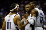 ORLANDO, FL - JUNE 09:  (R-L) Dwight Howard #12, Rashard Lewis #9, Hedo Turkoglu #15 and Courtney Lee #11 of the Orlando Magic talk in the second quarter against the Los Angeles Lakers in Game Three of the 2009 NBA Finals on June 9, 2009 at Amway Arena in Orlando, Florida.  NOTE TO USER:  User expressly acknowledges and agrees that, by downloading and or using this photograph, User is consenting to the terms and conditions of the Getty Images License Agreement.  (Photo by Chris Graythen/Getty Images)