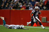 FOXBORO, MA - DECEMBER 23: Troy Brown #80 of the New England Patriots gains yardage against the defense of Courtney Bryan #47 of the Miami Dolphins at Gillette Stadium on December 23, 2007 in Foxboro, Massachusetts. Patriots won 28-7. (Photo by Jim Rogash/Getty Images)
