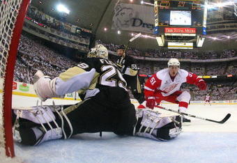 PITTSBURGH - JUNE 09:  Goaltender Marc-Andre Fleury #29 of the Pittsburgh Penguins defends the goal against Valtteri Filppula #51 of the Detroit Red Wings during Game Six of the NHL Stanley Cup Finals at the Mellon Arena on June 9, 2009 in Pittsburgh, Pennsylvania.  (Photo by Jim McIsaac/Getty Images)
