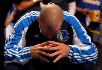 DENVER - MAY 05:  Jason Kidd #2 of the Dallas Mavericks pauses during warm ups prior to facing the Denver Nuggets in Game Two of the Western Conference Semifinals during the 2009 NBA Playoffs at Pepsi Center on May 5, 2009 in Denver, Colorado. The Nuggets defeated the Mavericks 117-105. NOTE TO USER: User expressly acknowledges and agrees that, by downloading and or using this photograph, User is consenting to the terms and conditions of the Getty Images License Agreement.  (Photo by Doug Pensinger/Getty Images)