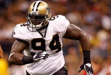 NEW ORLEANS - OCTOBER 12:  Charles Grant #94 of the New Orleans Saints plays against the Oakland Raiders during their NFL game on October 12, 2008 at the Superdome in New Orleans, Louisiana. The Saints defeated the Raiders 34-3.  (Photo by Chris Graythen/Getty Images)