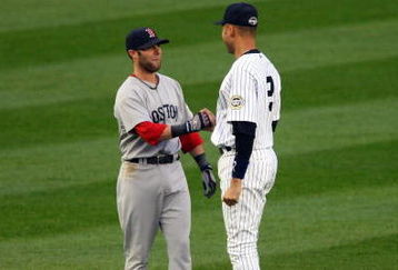 NEW YORK - MAY 05:  Derek Jeter #2 of the New York Yankees talks with Dustin Pedroia #15 of the Boston Red Sox prior to their game on May 5, 2009 at Yankee Stadium in the Bronx borough of New York City.  (Photo by Jim McIsaac/Getty Images)