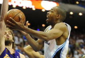ORLANDO, FL - JUNE 09:  Rafer Alston #1 of the Orlando Magic lays the ball up over Pau Gasol #16 of the Los Angeles Lakers in Game Three of the 2009 NBA Finals on June 9, 2009 at Amway Arena in Orlando, Florida.  NOTE TO USER:  User expressly acknowledges and agrees that, by downloading and or using this photograph, User is consenting to the terms and conditions of the Getty Images License Agreement.  (Photo by Ronald Martinez/Getty Images)