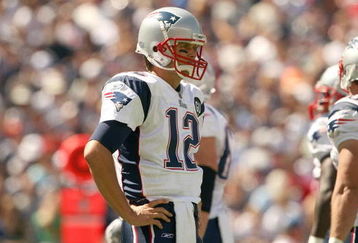 FOXBORO, MA - SEPTEMBER 7:  Quarterback #12 of the New England Patriots looks on during their NFL game against the Kansas City Chiefs on September 7, 2008 at Gillette Stadium in Foxboro, Massachusetts. The Patriots defeated the Chiefs 17-10. (Photo by Elsa Garrison/Getty Images)