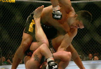 MANCHESTER, UNITED KINGDOM - APRIL 21: Lyoto Machida of Brazil and David Heath of England in action during a Welterweight bout of the Ultimate Fighting Championship at the Manchester Evening News Arena on April 21, 2007 in Manchester, England. (Photo by Gary M. Prior/Getty Images).