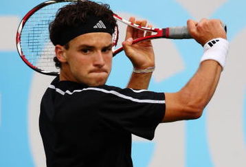 LONDON, ENGLAND - JUNE 10:  Grigor Dimitrov of Bulgaria plays a backhand during the men's second round match against Gilles Simon of France during Day 3 of the the AEGON Championship at Queens Club on June 10, 2009 in London, England.  (Photo by Ian Walton/Getty Images)