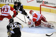 PITTSBURGH - JUNE 09: Tyler Kennedy #48 of the Pittsburgh Penguins shoots a goal past goaltender Chris Osgood #30 of the Detroit Red Wings during Game Six of the NHL Stanley Cup Finals at the Mellon Arena on June 9, 2009 in Pittsburgh, Pennsylvania. (Photo by Harry How/Getty Images)