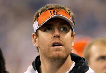 INDIANAPOLIS - DECEMBER 07:  Injured quarterback Carson Palmer of the Cincinnati Bengals looks on from the sideline against the Indianapolis Colts at Lucas Oil Stadium on December 7, 2008 in Indianapolis, Indiana.  (Photo by Andy Lyons/Getty Images)