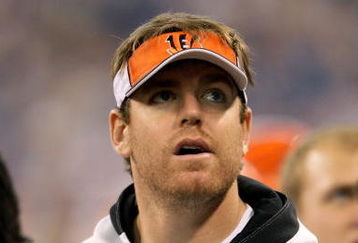 INDIANAPOLIS - DECEMBER 07:  Injured quarterback Carson Palmer of the Cincinnati Bengals looks on from the sideline against the Indianapolis Colts at Lucas Oil Stadium on December 7, 2008 in Indianapolis, Indiana.  (Photo by Andy Lyons/Getty Images)