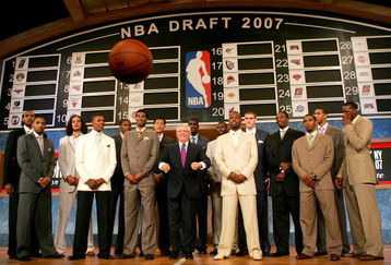 NEW YORK - JUNE 28: NBA Commissioner David Stern (C) throws a basketball at the media while posing with (L-R) Al Horford, Acie Law IV, Joakim Noah, Nick Young, Kevin Durant, Corey Brewer, Yi Jianlian, Greg den, Julian Wright, Rodney Stuckey, Spencer Hawes, Jeff Green, Mike Conley Jr., Brandan Wright and Al Thornton prior to the 2007 NBA Draft on June 28, 2007 at The WaMu Theatre at Madison Square Garden in New York City.  (Photo by Chris McGrath/Getty Images)