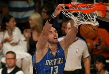 LOS ANGELES, CA - JUNE 04:  Marcin Gortat #13 of the Orlando Magic dunks the ball against the Los Angeles Lakers in the first half of Game One of the 2009 NBA Finals at Staples Center on June 4, 2009 in Los Angeles, California. NOTE TO USER: User expressly acknowledges and agrees that, by downloading and or using this photograph, User is consenting to the terms and conditions of the Getty Images License Agreement.  (Photo by Stephen Dunn/Getty Images)