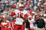 CHAPEL HILL - NOVEMBER 22:  Quarterback Russell Wilson #16 of the North Carolina State Wolfpack passes the ball during the game against the North Carolina Tar Heels at Kenan Stadium on November 22, 2008 in Chapel Hill, North Carolina. ( Photo by: Streeter Lecka/Getty Images)