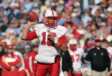 CHAPEL HILL - NOVEMBER 22:  Quarterback Russell Wilson #16 of the North Carolina State Wolfpack passes the ball during the game against the North Carolina Tar Heels at Kenan Stadium on November 22, 2008 in Chapel Hill, North Carolina. ( Photo by: Streeter Lecka/Getty Images)