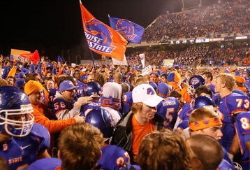 BOISE, ID - NOVEMBER 28: Boise State Broncos fans storm the field to celebrate their undefeated season and WAC championship after their game against the Fresno State Bulldogs on November 28, 2008 at Bronco Stadium in Boise, Idaho.  (Photo by Otto Kitsinger III/Getty Images)