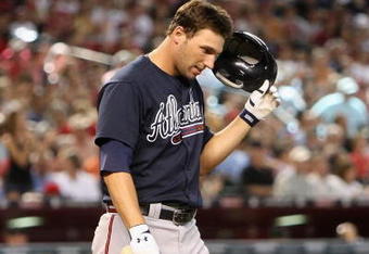 PHOENIX - MAY 30:  Jeff Francoeur #7 of the Atlanta Braves reacts after striking out against the Arizona Diamondbacks during the major league baseball game at Chase Field on May 30, 2009 in Phoenix, Arizona.The Diamondbacks defeated the Braves 3-2.  (Photo by Christian Petersen/Getty Images)