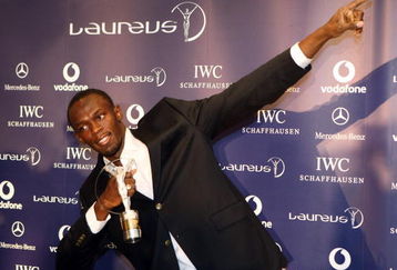 TORONTO, ON - JUNE 10:  Usain Bolt (JAM) world record holder for 100m and 200m, receives the Laureus World Sportsman of the year award during a  ceremony and press conference held at The Four Seasons Hotel  on June 10, 2009 in Toronto, Ontario.  (Photo by John Gichigi/Getty Images for Laureus)