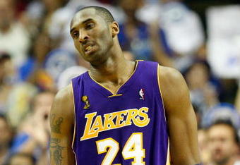 ORLANDO, FL - JUNE 09:  Kobe Bryant #24 of the Los Angeles Lakers reacts during the final seconds of the Lakers' loss to the Orlando Magic 108-104 in Game Three of the 2009 NBA Finals on June 9, 2009 at Amway Arena in Orlando, Florida.  NOTE TO USER:  User expressly acknowledges and agrees that, by downloading and or using this photograph, User is consenting to the terms and conditions of the Getty Images License Agreement.  (Photo by Ronald Martinez/Getty Images)