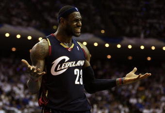 ORLANDO, FL - MAY 30:  LeBron James #23 of the Cleveland Cavaliers reacts after a play against the Orlando Magic in Game Six of the Eastern Conference Finals during the 2009 Playoffs at Amway Arena on May 30, 2009 in Orlando, Florida. NOTE TO USER: User expressly acknowledges and agrees that, by downloading and or using this photograph, User is consenting to the terms and conditions of the Getty Images License Agreement  (Photo by Elsa/Getty Images)
