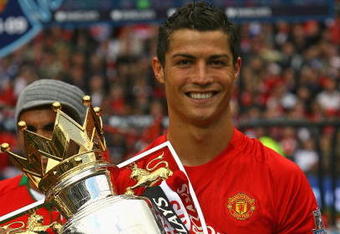 MANCHESTER, ENGLAND - MAY 16:  Cristiano Ronaldo of Manchester United lifts the Barclays Premier League trophy after the Barclays Premier League match between Manchester United and Arsenal at Old Trafford on May 16, 2009 in Manchester, England.  (Photo by Alex Livesey/Getty Images)