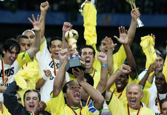 FRANKFURT, GERMANY - JUNE 29:  Ronaldinho captain of Brazil lifts the trophy following the FIFA 2005 Confederations Cup Final between Brazil and Argentina at the Waldstadion on June 29, 2005, in Frankfurt, Germany.  (Photo by Ben Radford/Getty Images)