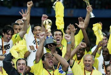 FRANKFURT, GERMANY - JUNE 29:  Ronaldinho captain of Brazil lifts the trophy following the FIFA 2005 Confederations Cup Final between Brazil and Argentina at the Waldstadion on June 29, 2005, in Frankfurt, Germany.  (Photo by Ben Radford/Getty Images)