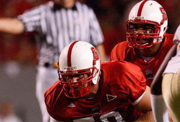 RALEIGH, NC - OCTOBER 16:  Ted Larsen #58 of the North Carolina State Wolfpack prepares to snap the ball to Russell Wilson #16 during the game against the Florida State Seminoles at Carter-Finley Stadium on October 16, 2008 in Raleigh, North Carolina.  (Photo by Kevin C. Cox/Getty Images)