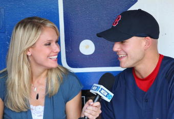 KANSAS CITY, MO - AUGUST 05: NESN reporter Heidi Watney interviews Justin Masterson #63 of the Boston Red Sox prior to action against the Kansas City Royals on August 5, 2008 at Kauffman Stadium in Kansas City, Missouri. (Photo by G. Newman Lowrance/Getty Images)