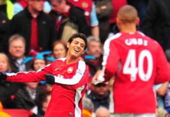 LONDON - MARCH 08:  Carlos Vela of Arsenal celebrates scoring his team's first goal  during the the FA Cup Sponsored by E.on 5th round match between Arsenal and Burnley at Emirates Stadium on March 8, 2009 in London, England.  (Photo by Mike Hewitt/Getty Images)