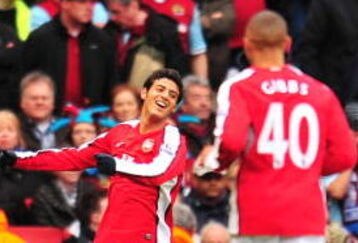 LONDON - MARCH 08:  Carlos Vela of Arsenal celebrates scoring his team's first goal  during the the FA Cup Sponsored by E.on 5th round match between Arsenal and Burnley at Emirates Stadium on March 8, 2009 in London, England.  (Photo by Mike Hewitt/Getty Images)