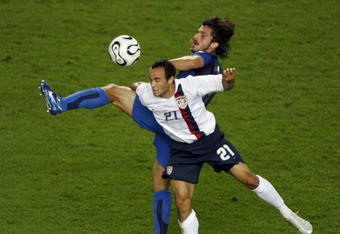 KAISERSLAUTERN, GERMANY - JUNE 17:  Landon Donovan of the USA battles for the ball with Gennaro Gattuso of Italy during the FIFA World Cup Germany 2006 Group E match between Italy and USA at the Fritz-Walter Stadium on June 17, 2006 in Kaiserslautern, Germany.
  (Photo by Michael Steele/Getty Images)