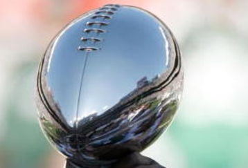 EAST RUTHERFORD, NJ - OCTOBER 26:  Members of the 1968 Jets touch the Lombardi Trophy during halftime festivities celebrating the 40th anniversary of the team's win over the Colts in Super Bowl III during the game between the Kansas City Chiefs and the New York Jets on October 26, 2008 at Giants Stadium in East Rutherford, New Jersey.  (Photo by Jarrett Baker/Getty Images)