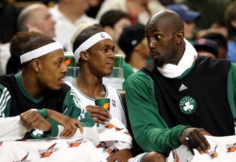 BOSTON - DECEMBER 03: Kevin Garnett #5(left) of the Boston Celtics talks with teammates Paul Pierce #34 and Rajon Rondo #9 late in the fourth quarter against the Indiana Pacers on December 3, 2008 at TD Banknorth Garden in Boston, Massachusetts. The Celtics defeated the Pacers 114-96. NOTE TO USER: User expressly acknowledges and agrees that, by downloading and or using this Photograph, user is consenting to the terms and conditions of the Getty Images License Agreement. (Photo by Elsa/Getty Images)