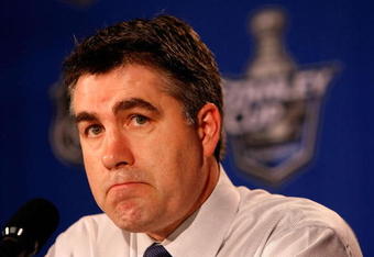 DETROIT - MAY 08:   Head coach Dave Tippett of the Dallas Stars talks with the media after being defeated in game one of the Western Conference Finals of the 2008 NHL Stanley Cup Playoffs to the Detroit Red Wings at Joe Louis Arena on May 8, 2008 in Detroit, Michigan. The Red Wings defeated the Stars 4-1 to set the series 1-0 Red Wings. (Photo by Dave Sandford/Getty Images)
